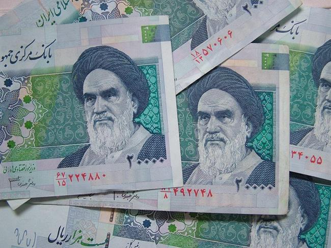 Iranski bankovec s podobo imama Homeinija, očeta islamske revolucije 1979